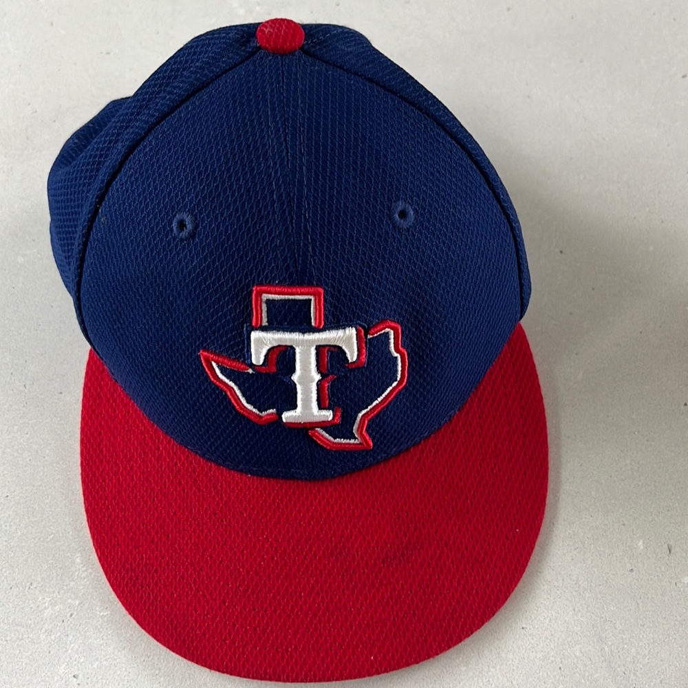 Texas Rangers fitted baseball hat. Size 7. Excellent condition. Authentic.